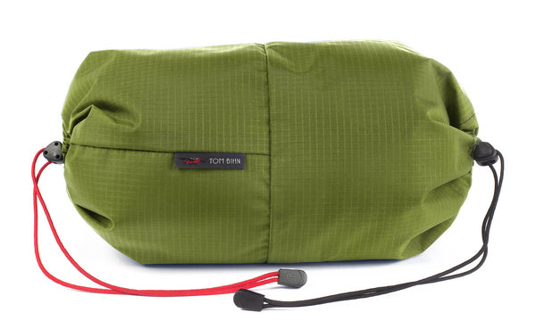 An Aeronaut 30 Travel Laundry Stuff Sack in Moss (green with light blue grid) 210 Cerylon.